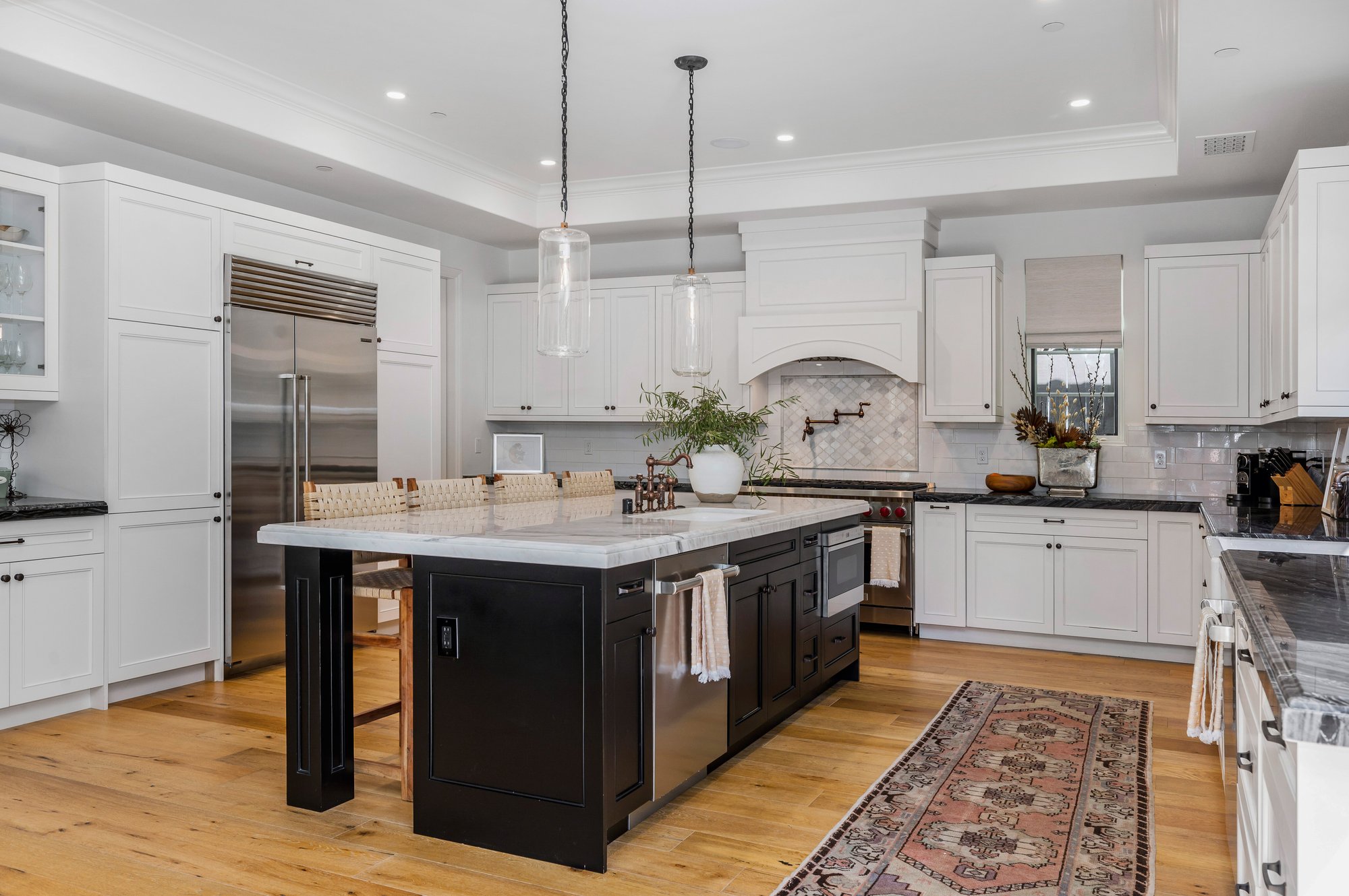 a-kitchen-with-a-table-that-has-chairs-around-it-a-2026-01-08-00-24-22-utc