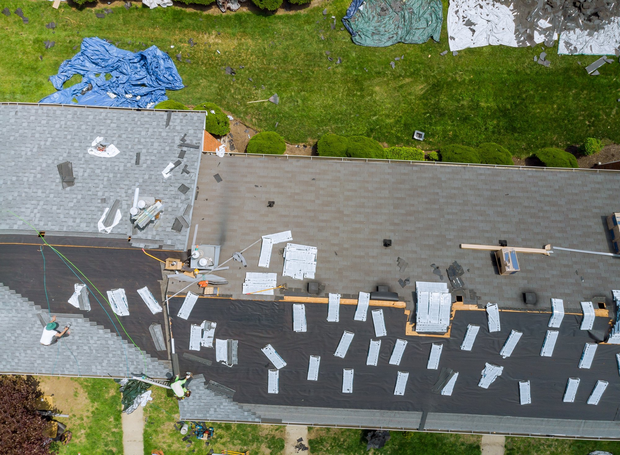 aerial-view-of-roof-construction-repairman-on-a-re-2025-03-27-05-06-37-utc aerial-view-of-roof-construction-repairman-on-a-re-2025-03-27-05-06-37-utc